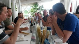 Nico Smits of Triple Air translating the menu card in restaurant